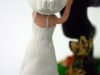 cake top sposa che insegue lo sposo